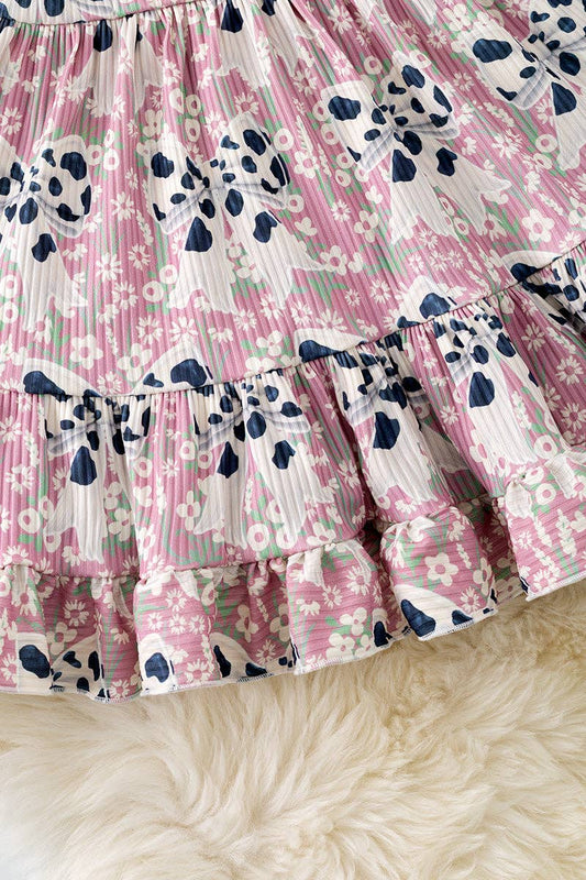 Cow printed coquette bow ruffle dress.