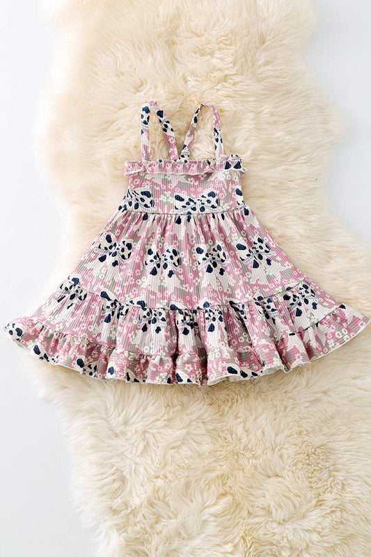 Cow printed coquette bow ruffle dress.
